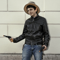 Italian cowboy with toy guns, Rome, Italy