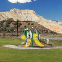 Playground under mountain bluff, Colorado