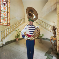 Tuba Player in Hotel Lobby